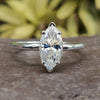 Classic Marquise Solitaire and Hidden Halo Moissanite Engagement Ring