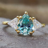 2.34 TW Pear Cyan Blue and Triangle Cut Three Stone Moissanite Engagement Ring