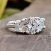 Round Trapezoid Three Stone Trellis Setting Moissanite Engagement Ring