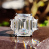 Trapezoid Emerald Step Cut Cathedral set Three Stone Engagement Ring