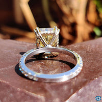 Hidden halo ring setting enhances the centre stone.
