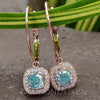 Dangle Drop Earrings - 1.44 TCW Cushion Cyan Blue Moissanite Halo Earrings
