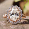 2.29 TW Oval Cut Twisted Outline Cathedral Set Moissanite Halo Engagement Ring