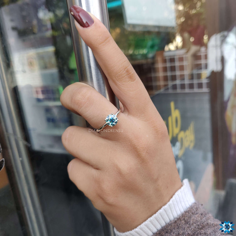 green moissanite ring