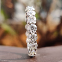 moissanite eternity wedding band