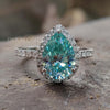 2.30 TCW Cyan Blue Pear Cut Halo Pave Moissanite Wedding Ring